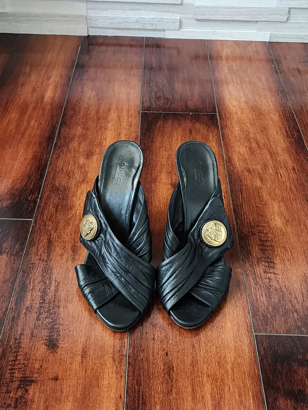 Gucci Black Leather High Heel Slide with Gold Medallion